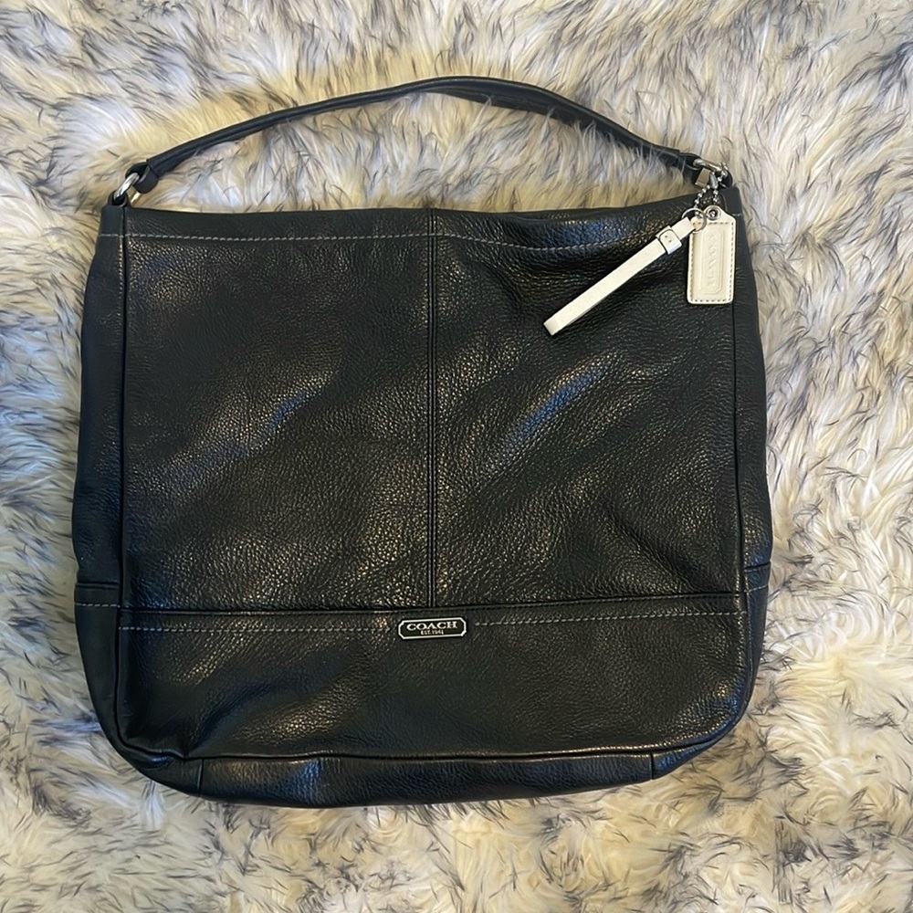 Coach tote. Black leather. 12 inches x 14 inches. Great condition.